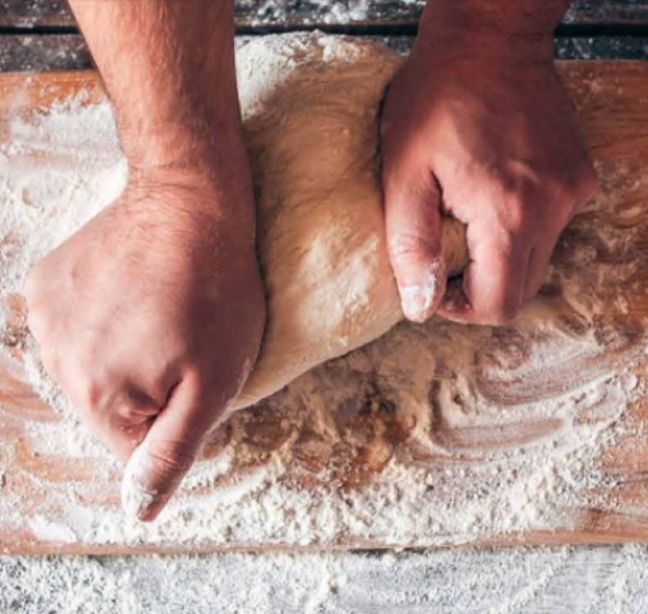 man making fresh pita chips