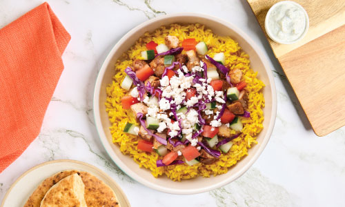 Mediterranean bowl with rice, falafel and fresh vegetables