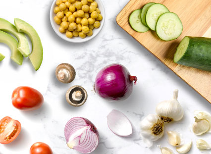 fresh ingredients including tomatoes, avocados, slice cucumbers and more